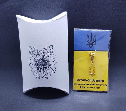 Gold Ukraine coat of arms pendant earrings on blue and yellow card with black sunflower box