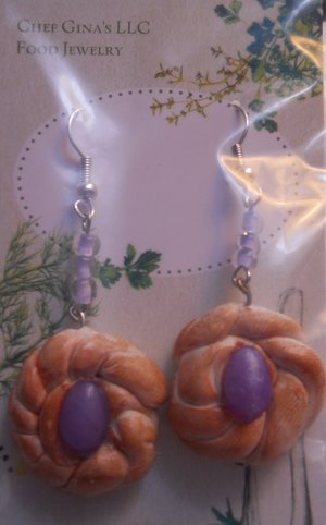 Pierogi Gifts Polish Easter bread earrings with detailed bread design and purple bead centerpiece