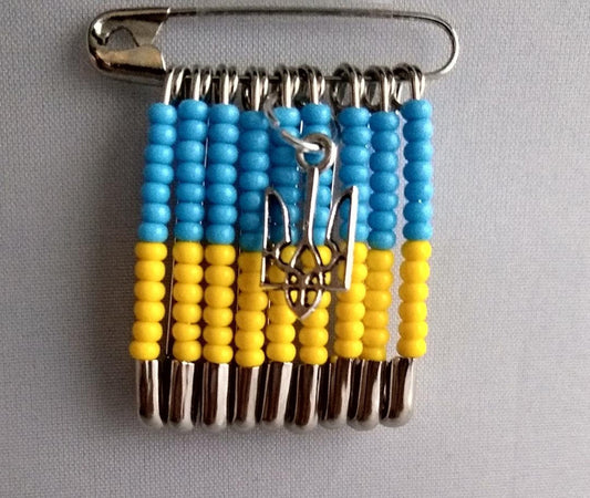 Ukraine flag jewelry safety pin with blue and yellow beads and trident charm accessory