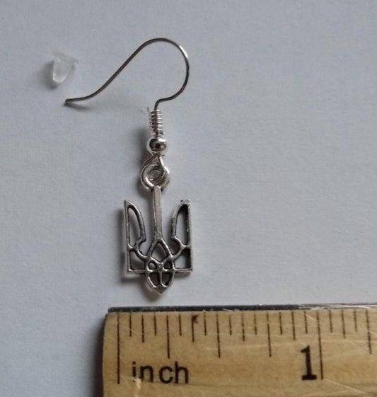 Silver Ukrainian coat of arms earrings shown next to ruler for size reference