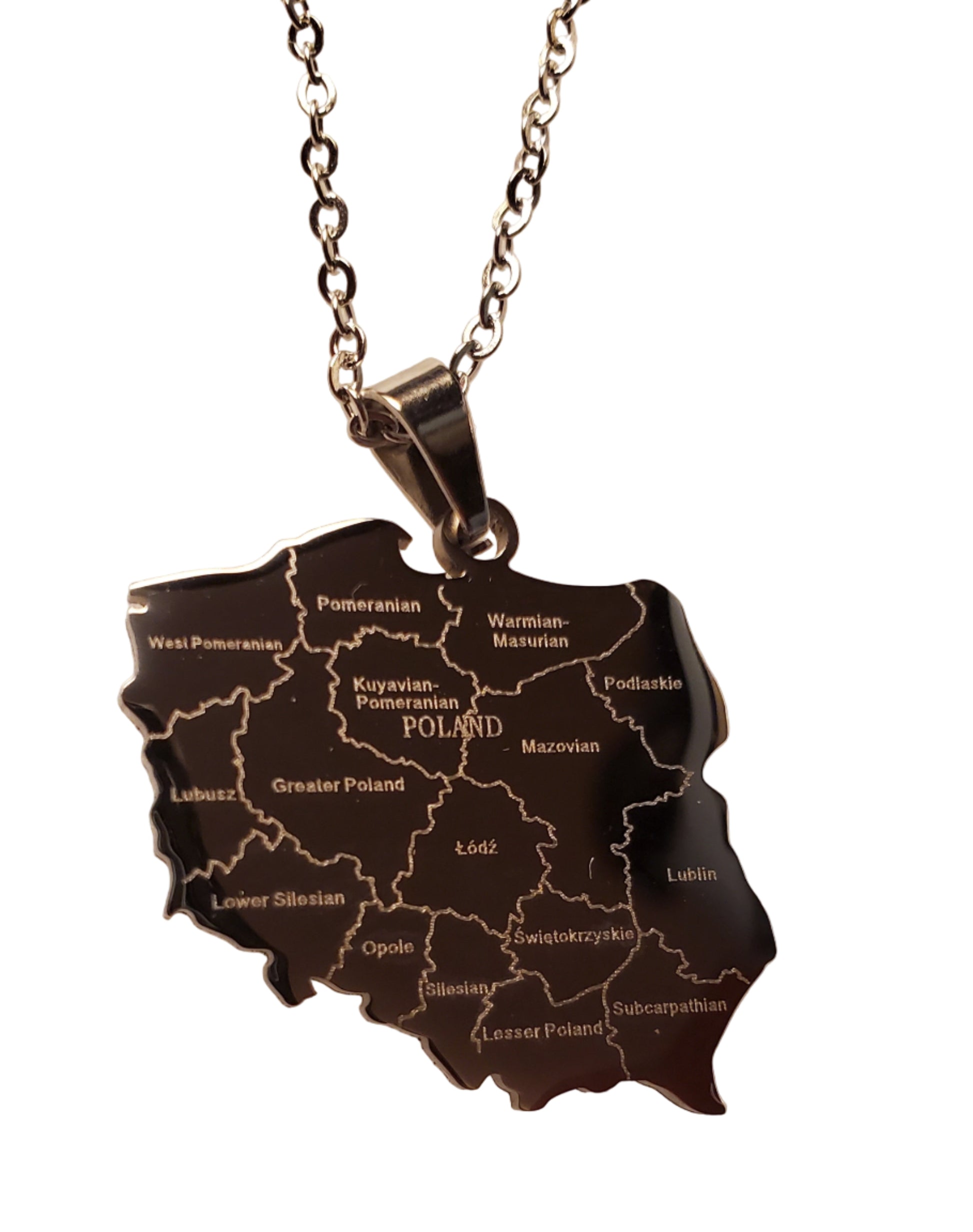 Necklace with a pendant shaped like a map on a beige background
