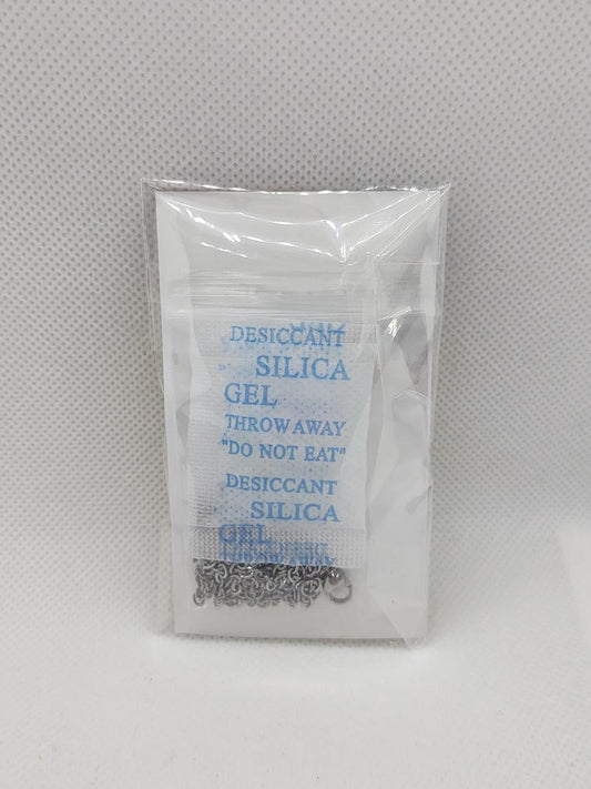 Romanian necklace stainless steel with intricate chain design packaged with silica gel desiccant