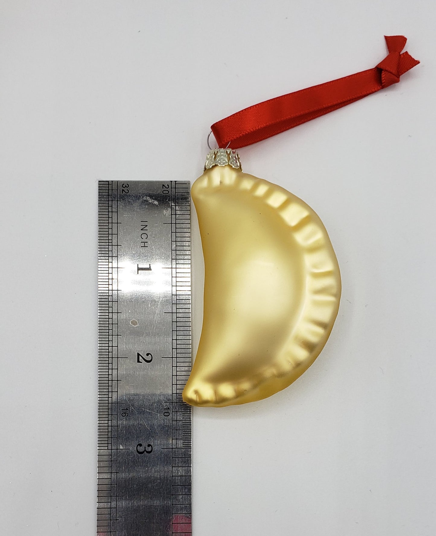 Pierogi ornament is 2.5 inches long